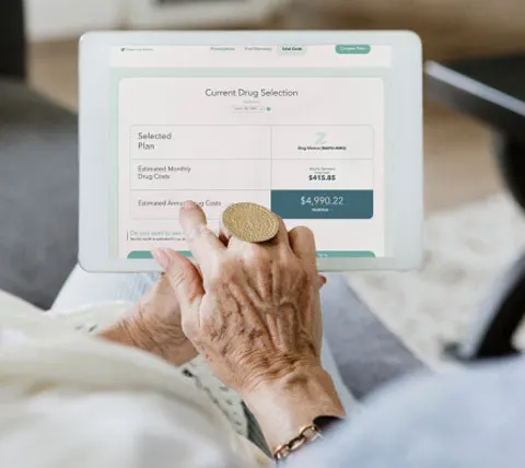 Old Woman Checking Current Drug Selection