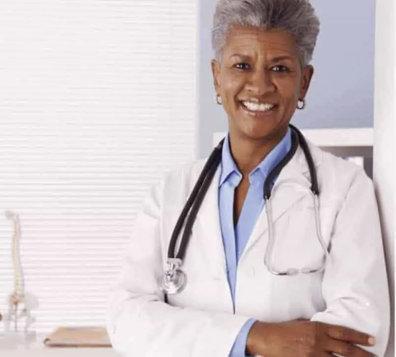 African-American female doctor smiling